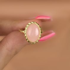 This knot rose quartz ring will be a perfect gift as a christmas for your best friend. Rose quartzring with made of gold plated 18 karat .925 sterling silver. Rose quartz is known as the crystal of unconditional love. It's said to boost feelings of self-love and foster loving relationships with others, Minimalist rose quartz will be a best gift idea for your mom or your loved ones as a birthday gift or anniversary gift.A perfect valentine's day gift as a handmade jewellery.You will add light to Pink Crystal Ring Gift, Rose Gold Rings With Rose Quartz For Gifts, Dainty Pink Gold Rings For Gift, Dainty Pink Gold Rings As Gift, Rose Quartz Crystal Ring Gift, Feminine Pink Rings For Gift, Adjustable Feminine Ring Suitable For Gifts, Feminine Ring-shaped Jewelry Gift, Pink Gold Gemstone Rings For Gifts