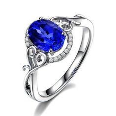 an oval shaped blue sapphire and diamond ring