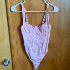 Reposhing This Item I Purchased From @Maggiemcgown. Loved It, But Ready To Rotate For Something New. Questions? Leave A Comment Below! Pink Underwire Bodysuit For Summer, Summer Pink Underwire Bodysuit, Pink Cotton Bodysuit For Beach, Spring Pink Bodysuit With Built-in Bra, Urban Outfitters Sleeveless Swimwear, Sleeveless Swimwear By Urban Outfitters, Sleeveless Urban Outfitters Swimwear For Swimming, Sleeveless Urban Outfitters Swimwear, Spring Bodysuit With Underwire And Lined Body