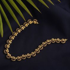 Description: This necklace, Priam, is the best example of simplicity. It is raw and traditional with delicate tribal motifs used to accentuate the look. It is crafted in gold plated with oxidized finish to give the definite earthy charm. It is beautifully framed to feel light around your neck. Details & Specifications: Materials used: Brass Alloy with Antique Gold platting Weight – Necklace-26 Length – Necklace-13 Make it custom Want to make it a custom necklace? Sure! Reach out to us at support Neck Details, Length Necklace, Custom Necklace, Antique Gold, Diamond Bracelet, Special Events, Turning, Gold Bracelet, Gold Plate