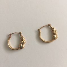 14k Yellow Gold Triple Heart Hoop Earrings. Perfect For All Ages. Hollow Various Size Hearts On The Hoop. A Little Over Half An Inch Long. Gold Engraved Hoop Earrings, Triple Heart, Heart Hoop Earrings, Gold Engraving, Earrings Color, Hoop Earrings, Jewelry Earrings, Yellow Gold, Women Jewelry