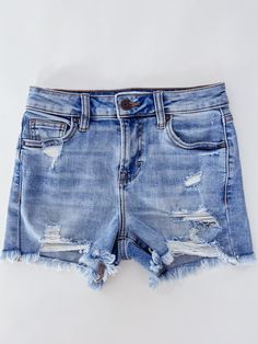 100% cotton Mid rise Frayed hem True to size. Sonika is 5'2, wearing an XS. Measurements based on a size small: Rise: 10” Inseam: 3” Opening: 24” Faded Mid-rise Denim Jean Shorts, Everyday Mid-rise Shorts With Frayed Hem, Mid-rise Faded Denim Shorts, Mid-rise Medium Wash Shorts With Frayed Hem, Mid Rise Denim Shorts, Distressed Mid-rise Denim Blue Shorts, Denim Wash, Denim Shorts, Mid Rise