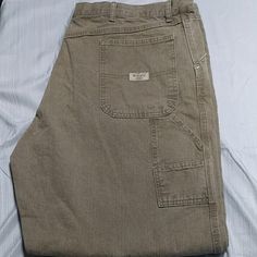 New Wrangler Carpenter Jeans Desert Tan Color Size 42x32 Relaxed Fit New Never Worn Casual Jeans For Rodeo, Casual Bottoms With Pockets For Rodeo, Vintage Cotton Bottoms For Rodeo, Cotton Jeans With Pockets For Rodeo, Cotton Jeans For Rodeo, Rugged Jeans With Pockets For Rodeo, Cotton Bottoms With Pockets For Rodeo, Carpenter Jeans, Wrangler Jeans