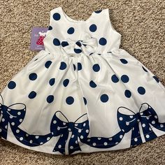 New With Tags Playful White Dress With Bow, Cute Polka Dot Dress-up Dresses, Cute Polka Dot Dress For Dress-up, Playful Polka Dot Dress For Dress-up, Playful Polka Dot Dress For Dress-up Occasions, Polka Dot Summer Dress For Formal Occasions, Playful Polka Dot Dress, Cute Polka Dot Dress, Polka Dot Cotton Playtime Dress