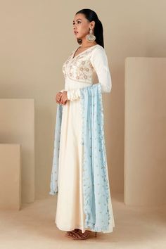 White crepe silk anarkali with floral hand embroidered yoke. Comes with a blue chiffon dupatta. - Aza Fashions Embroidered Georgette Churidar For Reception, Embroidered Georgette Maxi Length Dupatta, Embroidered Maxi Length Georgette Dupatta, Traditional Georgette Gown With Chikankari Embroidery, Georgette Churidar With Resham Embroidery, Embroidered Anarkali Set In Georgette, Embroidered Georgette Maxi Churidar, Embroidered Georgette Churidar In Maxi Length, Fitted Art Silk Anarkali Set With Chikankari Embroidery