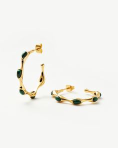 Magma Gemstone Medium Hoop Earrings | 18ct Recycled Gold Plated on Brass 18ct Gold Plated/Malachite. A Symbol of Transformation, Malachite Meets Molten in these Hoop Earrings. Wear Solo or Stack with Huggies for More Maximalist Styling. Also Available as Mini Hoop Earrings. Metal: 18Ct Recycled Gold Plated on Brass Dimensions: 27mm X 4mm Gemstone: Malachite Weight: 6. 73g Product Code: Gm-G-E14-Mal Mens Diamond Bracelet, Medium Hoop Earrings, Trending Bracelets, Coin Pendant Necklace, Earring Trends, Mini Hoop Earrings, Earrings Metal, Engraved Bracelet, Mens Silver Rings