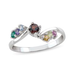 Create a unique and meaningful look with the personalized details of this gemstone family bypass ring. Fashioned in the metal of your choosing This design showcases the 3.5mm round natural or simulated gemstone you select at the center. Further customize the style with two to six dainty natural or simulated gemstones glistening beside the bypassing shank. Pick stones that reflect your loved one's birthdays for a unique and thoughtful style. Classic Birthstone Ring With Gemstone Accents, Fine Jewelry Multi-stone Birthstone Ring, Promise Ring Birthstone With Round Cut And Accent Stones, White Gold Multi-stone Birthstone Ring, Elegant Adjustable Multi-stone Birthstone Ring, Birthstone Promise Ring With Accent Stones, May Birthstone Ring With Round Cut And Accent Stones, May Birthstone Ring With Accent Stones And Round Cut, May Birthstone Ring With Accent Stones