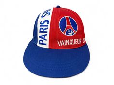 Vintage Paris Saint Germain hat. Snapback closure with embroidered graphics Brand: N/A Size: Adjustable (One Size Fits Most) Condition: Good Flaws: Faint staining to sweatband. Minor seam separation on top of crown Retro Snapback Hat With Embroidered Logo For Baseball Season, Retro Trucker Hat With Curved Brim For Sports, Throwback Trucker Hat For Sports Events, Retro Snapback Fitted Hat For Sports Events, Baseball Cap With Cotton Sweatband For Sports, Adjustable Hats With Cotton Sweatband For Sports, Retro Six-panel Baseball Cap For Sports, Retro Embroidered Logo Snapback Hat For Streetwear, Retro Sports Baseball Cap