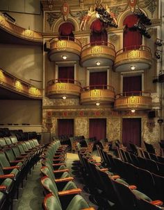 an empty auditorium filled with lots of seats