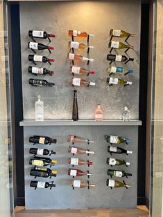 a wine rack filled with lots of bottles