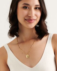 Timeless elegance combined with modern playfulness to create our gold Ancona necklace. Minimal yet detailed this necklace is the perfect layering piece you need in your summer wardrobe. Wear with the colourful Pompei Necklace or keep it classic with our Monti choker. 
Details

Handcrafted in a thick layer of 18k gold on sterling silverAdjustable chain length: 50 cm + 5 cm extenderPendant size: 1,8 cm x 1,6 cmChain width: 1,6 mmLuxurious cotton pouch & jewellery box with every order Elegant Rectangular Clavicle Chain Necklace, Classic Initial Necklace For Formal Occasions, Chic Everyday Necklace With Rectangular Pendant, Chic Rectangular Necklace With Adjustable Chain, Minimalist Formal Necklaces With Rectangular Pendant, Minimalist Rectangular Pendant Necklace For Formal Occasions, Modern Rectangular Clavicle Chain Necklace, Formal Initial Pendant Necklace, Everyday Necklace With Rectangular Pendant