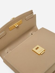 Unlocked Box Flap Bag takes classic elegance and accentuates it with our signature lock closure, inspired by an antique door handle. Day or night, you’ll find yourself instinctively reaching for this minimal masterpiece. - Full-grain cross grain calfskin from USA - Matching color microsuede interior - One internal slip pocket - One adjustable shoulder strap - Care: Wipe clean with damp cloth - Height: 6.5" - Length 8" - Depth: 3.25" - Weight: 1.2 lb - Cross-body - Shoulder Bag Parisa Wang, Antique Door, Vintage Door, Modern Minimalism, Purses Designer, By Grace, The Grace, Grace Kelly, Flap Bag