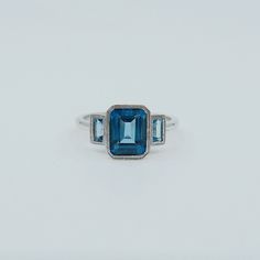 This beautiful 3 stone ring is an instant classic. The shades of blue stones in combination with the timeless shape of the ring make it a perfect engagement ring for the unconventional bride or even a right hand ring. Details: 14k gold (available in rose, white and yellow) Emerald cut London Blue Topaz about 8x6mm Bagu Blue Stone Wedding Rings, Unconventional Bride, 3 Stone Ring, Right Hand Ring, Emerald Cut Rings, London Blue Topaz Ring, Colorful Life, Blue Stones, Right Hand Rings