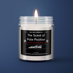 the scent of pole position scented candle on a blue background with an advertise