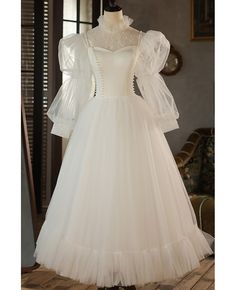 Get 10% off now! Buy retro beaded pearls tea length tulle wedding dress with high neck long sleeves at wholesale price online. Free shipping and pro custom service since 2009. Wedding Dress With High Neck, Retro Wedding Dress, Antique Wedding Dresses, Tea Length Tulle, Dress With High Neck, Wedding Dress Ivory, Long Wedding Dress, Bridal Gowns Vintage, Dress Design Sketches