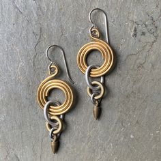 Yellow Gold Spiral Earrings With Ear Wire, Nickel-free Gold Steampunk Jewelry, Gold Wire Wrapped Metal Earrings, Adjustable Spiral Brass Earrings, Gold Steampunk Earrings, Gold Metal Earrings With Wire Wrapped Detail, Gold Steampunk Nickel-free Jewelry, Bronze Brass Wire Wrapped Hoop Earrings, Nickel-free Spiral Brass Jewelry