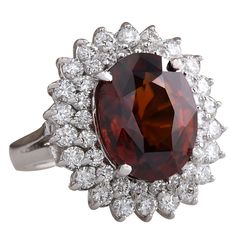 Stamped: 14K White Gold Total Ring Weight: 6.8 Grams Ring Length: N/ARing Width: N/A Gemstone Weight: Total Natural Hessonite Garnet Weight is 9.41 Carat (Measures: 13.30x10.70 mm) Color: Red Diamond Weight: Total Natural Diamond Weight is 1.60 Carat Quantity: 44 Color: F-G, Clarity: VS2-SI1 Face Measures: 21.00x19.30 mm Sku: [703128W] Oval Multi-stone Ruby Ring For Formal Occasions, Exquisite Multi-stone Ruby Ring For Formal Occasions, Exquisite Multi-stone Ruby Ring For Formal Events, Formal Garnet Rings With Brilliant Cut, Formal Round Garnet Cluster Ring, Elegant Cluster Ruby Ring For Formal Occasions, Elegant Cluster Gemstones For Formal Occasions, Formal Multi-stone Garnet Rings, Formal Cluster Ruby Ring With Gemstone