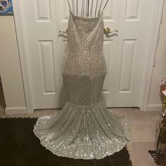 Nwot Beautiful Silver Sequined Sparkly Evening Gown. Has A Nude Lining. By F&P. Never Been Worn. Glamorous Floor-length Contrast Sequin Fabric, Glamorous Wedding Mermaid Dress With Sequins, Glamorous Champagne Sequin Dress For Evening, Champagne Sequined Floor-length Mermaid Dress, Champagne Floor-length Sequined Mermaid Dress, Glamorous Sparkling Sequin Floor-length Dress, Champagne Sleeveless Sequin Gown, Glamorous Sequin Maxi Gown, Glamorous Sequined Gown For Prom Season