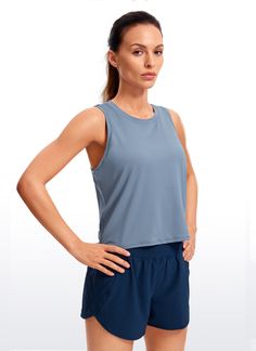 Ultra-lightweight and soft fabric with good breathability to keep you cool, and ultra-fine brushed feel for a comfortable and skin-friendly experience. High neck sport tank top with oversized armholes allows you to move freely without restraint. Great for running, exercise and other intense sports. Feature & Fitting: 
 Design for running, exercise 
 Cropped length, loose-fitting 
 Oversized armholes and high neck 
 Fabric: 
 Soft and lightweight fabric 
 Ultra-fine brushed feel 
 Four-way st Sporty High Stretch Tank Top For Training, Blue Breathable Sleeveless Tank Top, Breathable Blue Sleeveless Tank Top, Gray Sleeveless High Stretch Top, Yoga Tank Top With Moisture-wicking And 4-way Stretch, Yoga Moisture-wicking 4-way Stretch Tank Top, 4-way Stretch Tank Sports Bra For Gym, Gray Sleeveless Seamless Activewear, Tank Style 4-way Stretch Sports Bra For Gym