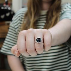 An adorable black cat ring made with enamel and sterling silver. This handmade ring uses sterling silver and enamel that has been fired at 1400 degrees in a kiln. Available in whole sizes 6 through 9. Made to last a lifetime! Shipped as a gift in a gift box using First Class Mail with tracking. To see my entire store go here:  https://www.etsy.com/shop/marmar To see my gemstone and modern store go here: https://www.etsy.com/shop/marmarModern To see my pewter and glass store go here: https://www. Glass Store, Modern Store, Vitreous Enamel, Cat Ring, Cute Box, Enamel Ring, Cat Jewelry, Cat Drawing, Ring Sterling Silver