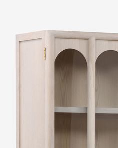 a wooden cabinet with two open doors