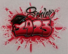 graffiti writing on a white shirt that says senior 2013