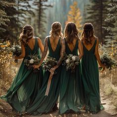 the bridesmaids are wearing green dresses and holding bouquets in their hands as they walk through the woods