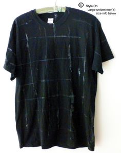 This is a NEW tie dyed tee shirt Black with Hand painted with professional artist fabric paint. It is one of a kind. The manufacture or the original Tee shirt is Gildan, 100% cotton. THIS NEW T-SHIRT HAS BEEN WASHED after it was painted & is ready to wear! SIZE LARGE: Approx. dimensions according to Gildan are as follows: Width across the chest is approx. 21 211/2 inches, Length is approx. 29 inches, shoulders is approx. 20 1/2 - 21 inches Washing Instructions: Inside out gentle wash, tumble Alternative Style Short Sleeve Cotton Shirt, Alternative Style Cotton Shirt For Summer, Alternative Style Cotton Summer Shirt, Black Pre-washed Cotton Tops, Alternative Style Cotton Shirt With Relaxed Fit, Pre-washed Cotton Grunge T-shirt, Black Distressed Cotton Shirt, Distressed Black Cotton Shirt, Grunge Style Pre-washed Short Sleeve T-shirt