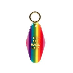 a rainbow colored keychain with the words you are magic baby written on it