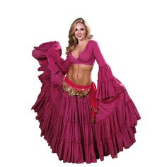 a woman in a pink belly dance outfit with her hands on her hips and one hand on her hip