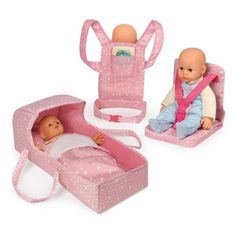 two baby dolls sitting in their pink cradles and one is laying on the ground