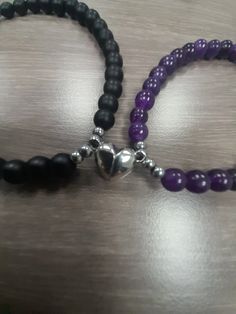 Couples/Friendship bracelet. Magnetic heart connector. Purple and black. Customizable sizes available. Heart Friendship Bracelet, Bracelet Couples, Black Couple, Couple Bracelet, Bracelet Couple, Purple Heart, Friendship Bracelet, Stretch Bracelet, Stretch Bracelets