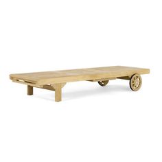 a wooden table with wheels on it