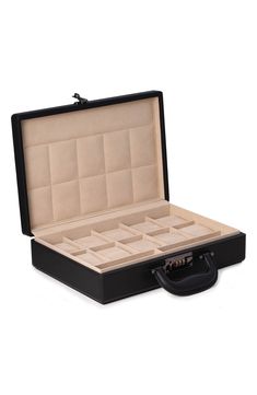 Store your watch collection in a handsome case designed with a rich leather exterior and plush suede lining. A three-digit combination lock adds an extra layer of security to protect your timepieces. 13.5" x 3.5" x 9.5" Holds up to 10 watches Three-digit combination locking cover Leather Imported Classic Rectangular Watch Case For Business, Classic Rectangular Business Watch Case, Classic Box-shaped Watch Accessories For Business, Black Rectangular Case Watch Accessories For Formal, Classic Business Watch Accessories Box, Classic Formal Watch Accessories With Case, Formal Rectangular Watch Case Accessories, Classic Rectangular Watch Storage Accessories, Classic Rectangular Watch Storage Box