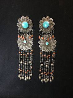 "Earrings ~ Afghanistan, Antique pair of earrings, Silver, Coral and Turquoise. 1930s early to mid 20th century. Length: 6\" Width: 1 3/4\" Tribal Silver Such an Amazing Find. Yes ~ along with basic simplicity ~ It's all about you You deserve to know about my fabulous Treasure chest HeartbeatHandmade and Big Sur Jade Treasures both (Etsy sites) Tribal Jewelry, Statement Piece Jewelry, Art to Wear Jewelry, Fantastic Fine Leather Beaded Handbags, an array of treasures for the traveler and mystic w Vintage Patina Earrings, Collectible Bohemian Earrings, Bohemian Collectible Earrings, Statement Piece Jewelry, Fancy Hands, Pacific Grove, Hippie Earrings, Beaded Handbag, Jewelry Statement