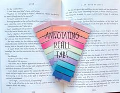 an open book with colorful strips of paper stuck to it's cover and the title annotating refill tabs