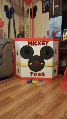 there is a mickey mouse box on the floor