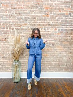 The Val Bowtie Denim Jacket delivers great quality and trendiness, perfect for the upcoming fall season. Its cute bowtie design adds a touch of charm, making it a stylish addition to any wardrobe. Upgrade your look with this versatile and on-trend denim jacket. Model is wearing a small.