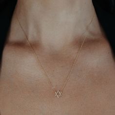 This high-polished 14K yellow gold Star of David pendant is the perfect go-to gift for your next Bar Mitzvah. 14K Yellow Gold Length: 18 Inches Silver Star Of David Necklace In 14k Gold, 14k Gold Silver Star Of David Necklace, Fine Jewelry Star Of David Necklace With Star Charm, Yellow Gold Star Of David Necklace With Polished Finish, Star Of David Yellow Gold Jewelry Gift, 14k White Gold Star Necklace, 14k Gold Star Of David Jewelry Gift, 14k Gold Star Of David Necklace Gift, Gift 14k Gold Star Of David Necklace