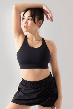 Your movement could use support. Meet the not-so basic sports bra designed to bring comfort to your next Pilates session. Everyday Stretch Seamless Activewear, Sporty Activewear With Medium Support For Everyday, Sporty Everyday Activewear With Medium Support, Black Sports Bra With Built-in Bra And Minimal Stretch, Seamless Minimal Stretch Racerback Activewear, Black 4-way Stretch Activewear, Gym Activewear With Built-in Bra And Minimal Stretch, Everyday Athleisure Sports Bra, Everyday Athleisure With Light Support