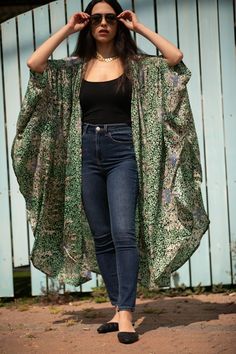 "Women's Green & Gold Sparkly Kimono Robe, Boho Chic Oversize Cardigan Top, Wrap Kimono Jacket, Long Stylish Silky Kimono Robe This is the perfect lightweight Kimono, Trendy and high quality, with a statement that cannot be ignored. For Summer, spring, or fall, and looks amazing with just a simple pair of jeans and a tank top!  It has a beautiful print. It has tassels in the hemline, which makes it chic and bohemian, it drapes beautifully and has square oversized sleeves. Size - Available in 1 S Green One Size Cardigan, Green Kimono With Kimono Sleeves, Green Free Size Kimono With Kimono Sleeves, Green One Size Kimono For Festival, One Size Green Kimono For Festival, Green One-size Festival Kimono, Green V-neck Kimono For Fall, Green Bohemian Cardigan For Festival, Oversized Bohemian V-neck Outerwear