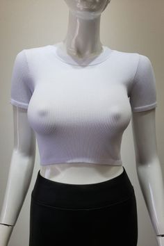 This white ribbed short-sleeved crop seamless top is designed to provide a streamlined and stylish fit. With ribbed material for flexibility and a slim-fit crop style, you'll enjoy a flattering silhouette. A comfortable top perfect for everyday wear. Fabric & fit: 92% Nylon 8% Spandex The model is wearing a size Small. Seamless Top, Crop Style, Ribbed Shorts, Comfortable Tops, Cropped Style, White White, Everyday Wear, Slim Fit, Spandex