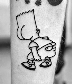 a person with a cartoon tattoo on their arm