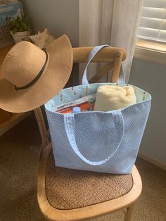 "Sand and Sun Roomy Beach Tote, Shopping or Market Bag!  This roomy bag with a fun summer seaside print to carry all of your necessities for that lounge Beach Day.  Plenty of space for beach towel, sunscreen, foldable hat, zipper pouch, snacks and water plus more!  Simple design, machine washable and dryable.  Iron if you wish for that crisp look.   ☀️ SIZE 20\" wide x 13.5\" tall x 7\" deep flat bottomed ☀️ FEATURES I used quality 100% cotton fabrics for the exterior and interior for the beach themed bag, and a sturdy stabilizer for the structure of the bag.  The handles are 17\" in length.   ☀️ CARE This bag is completely machine washable and dryable on low heat.  You may touch it up with an iron if you  prefer that crisp look. ☀️ GIFT I will be happy to ship your item directly to your g Casual Reversible Beach Bag For Vacation, Summer Beach Bag With Pockets, Summer Beach Bag With Pockets For Vacation, Blue Bags For Weekend Trips, Beach Tote Bag With Pockets, Blue Bags For Weekend Trips In Summer, Reversible Tote Beach Bag For Travel, Reversible Blue Shoulder Bag For Beach, Reversible Blue Shoulder Bag For The Beach