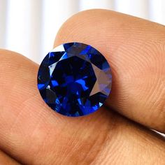 Welcome To, MAKKAHGEMS Brilliant Blue Sapphire High Top quality gemstone round shape Beautiful Gemstone size12x12x7MM Carat-7.95 And (extra gift) Type Of Gemstone  :  Sapphire Gemstone Gemstone   :  Orange  Sapphire Total Carat  :  7.95 Length  : 12MM Width  :   12MM Depth  :  7MM Shape  :  Round Shape Cut Grade : Excellent Handling Time : 1-2 Working Days Natural / Lab Created : Lab Created Thankyou For Visit My Shop Faceted Round Sapphire Gemstones, Faceted Round Sapphire Jewelry, Round Faceted Gemstones For Gifts, Faceted Round Gemstones For Gift, Formal Round Faceted Gemstones, Faceted Round Gemstones For Formal Occasions, Round Faceted Gemstones For Formal Occasions, Blue Round Faceted Jewelry, Blue Faceted Round Jewelry