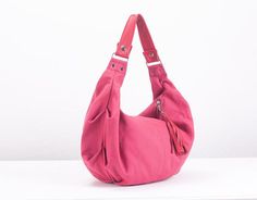 This is the mini version of the Kallia bag.For those who aren't used in carrying large purses,this is the ideal size.Still roomy enough to carry your daily essentials inside but in a smaller size.This slouch bag was made using a pink cotton canvas and genuine leather for the handle and zipper pulls.All the leather parts can be removed from the bag so it is easier to clean it ,in case it gets dirty.Not to mention that you can order extra handles and zipper pulls and interchange the colors dependi Pink Casual Satchel Hobo Bag, Casual Pink Satchel Hobo Bag, Pink Casual Hobo Bag, Pink Hobo Tote Bag For Daily Use, Pink Hobo Bag For Daily Use, Pink Tote Hobo Bag For Daily Use, Versatile Pink Hobo Bag, Versatile Pink Hobo Bag For Daily Use, Pink Canvas Bag With Leather Handles For Daily Use