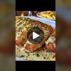 an image of food being served on a plate with cheese sauce and parmesan