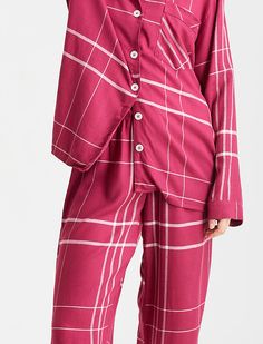 Add a pop of color to your sleepwear collection with these raspberry-pink plaid pajamas. The soft cotton fabric and playful pattern make them a must-have for anyone looking for a comfortable and stylish bedtime look. 100% Brushed Viscose Breathable Elastic waist with drawstring Top - Long sleeve button-up top, notched collar, chest patch pocket Bottoms - Full length, full elastic waistband with drawcord Cold, gentle machine wash Silk Set, Drawstring Top, Plaid Pajamas, Raspberry Pink, Sleep And Loungewear, Silk Pajamas, Liberty Fabric, Pink Plaid, Notched Collar