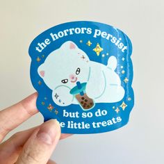 someone holding up a sticker that says, the horrors perish but so do the little treats