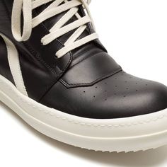 Rick Owens Geobasket High-Top Sneakers Designer's ID: RU01B1894-LPO These black and white Geobasket sneakers from Rick Owens are a must-have for the stylish man. The geometric details on the leather upper give these sneakers a unique look, while the side zip closure makes them easy to put on and take off. Plus, the TPU sole provides durability and support. Composition: Leather Made in ITALY Rick Owens Geobasket, Rick Owens Shoes, The Rick, Stylish Man, Shark Tooth, Shoes Collection, Wedge Sneaker, Lace Closure, Rick Owens